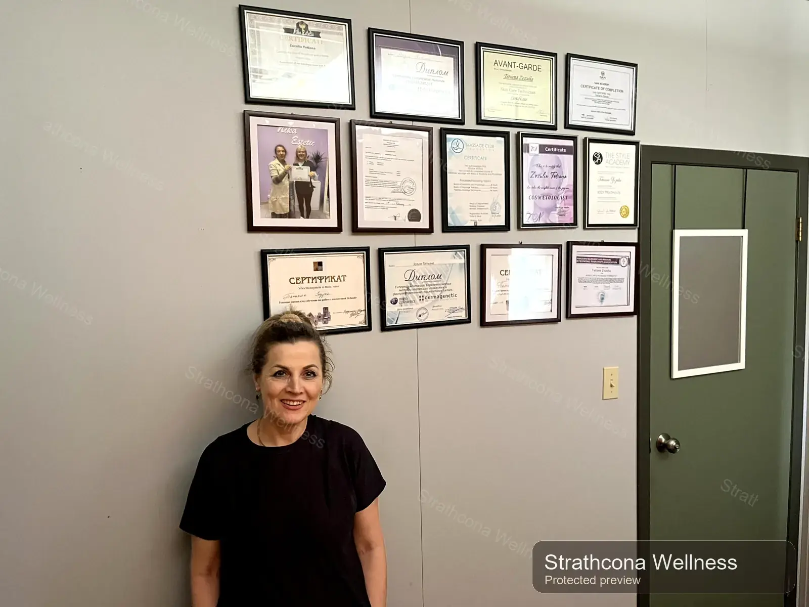Provider portrait with certificate wall at Strathcona Wellness